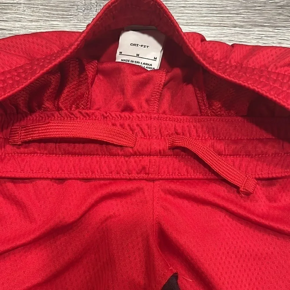 Nike Boys athletic dri-fit shorts red/black with pockets and cinch waist - M